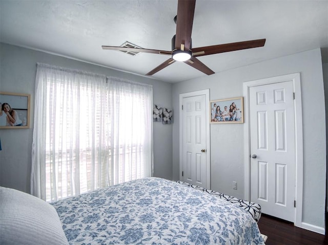 3109 SW 45th St, Oklahoma City, OK 73119 - bedroom with dark wood-type flooring, ceiling fan, and baseboards