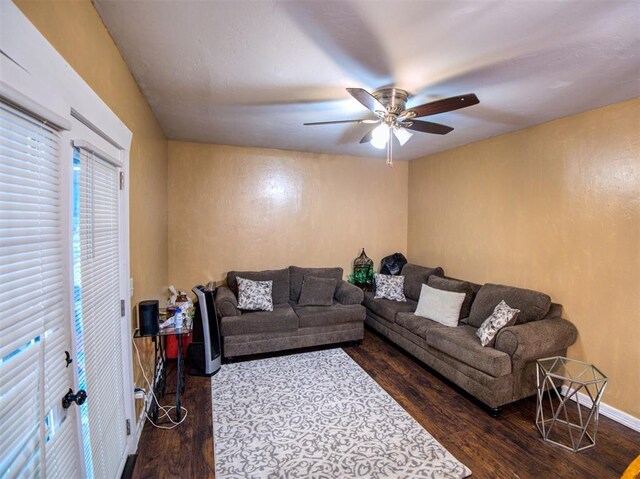 3109 SW 45th St, Oklahoma City, OK 73119 - living room featuring wood finished floors, ceiling fan, and baseboards
