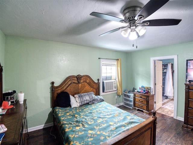 3109 SW 45th St, Oklahoma City, OK 73119 - bedroom with dark wood-type flooring, baseboards, a ceiling fan, and cooling unit