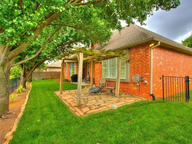 5608 NW 103rd St, Oklahoma City, OK 73162 - back of house with a pergola, brick siding, a shingled roof, and a patio