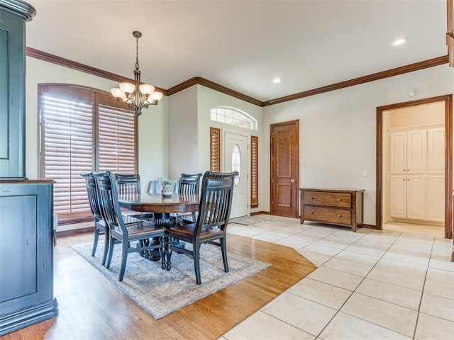 5608 NW 103rd St, Oklahoma City, OK 73162 - dining area with a chandelier, healthy amount of natural light, ornamental molding, light tile patterned flooring, and recessed lighting