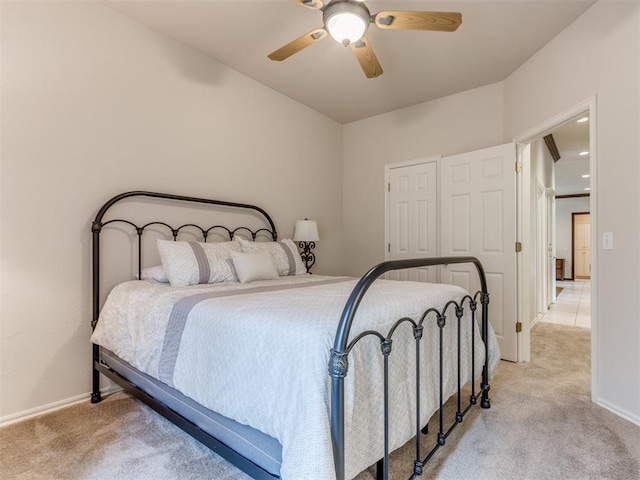 5608 NW 103rd St, Oklahoma City, OK 73162 - bedroom featuring light colored carpet, baseboards, and a ceiling fan
