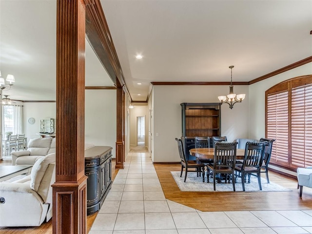 5608 NW 103rd St, Oklahoma City, OK 73162 - dining space with a chandelier, ornamental molding, light tile patterned floors, baseboards, and recessed lighting