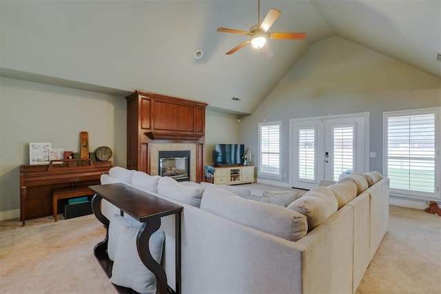 1401 Berkshire Pl, Shawnee, OK 74804 - living room with a large fireplace, a ceiling fan, light carpet, and high vaulted ceiling