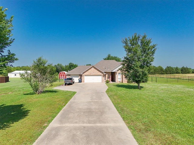 1811 N Bryan St, Shawnee, OK 74804 - view of front of home with an attached garage, concrete driveway, and brick siding