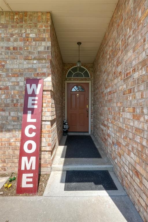 1811 N Bryan St, Shawnee, OK 74804 - property entrance featuring brick siding