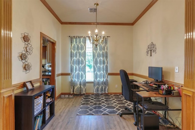 1811 N Bryan St, Shawnee, OK 74804 - office with a chandelier, wood finished floors, ornamental molding, and baseboards