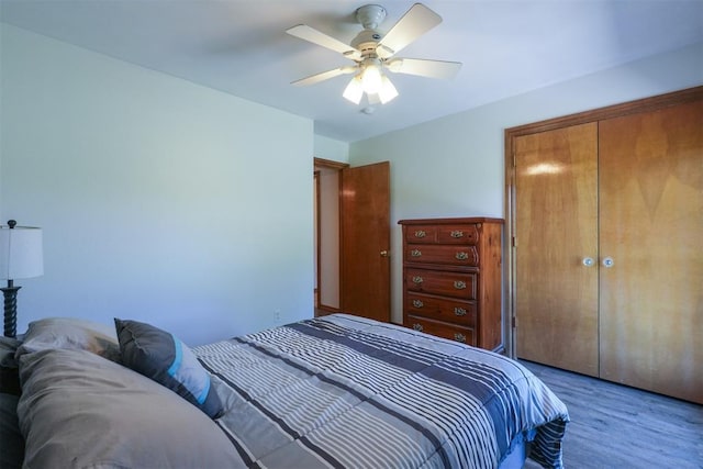 1811 N Bryan St, Shawnee, OK 74804 - bedroom with wood finished floors, a ceiling fan, and a closet