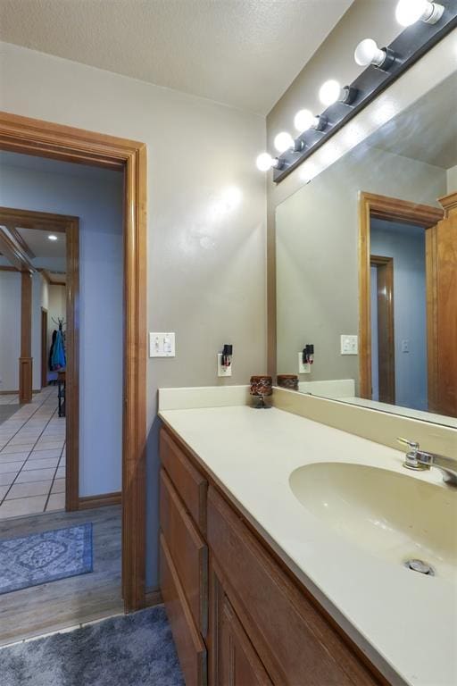 1811 N Bryan St, Shawnee, OK 74804 - bathroom featuring vanity and wood finished floors