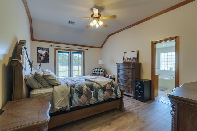 1811 N Bryan St, Shawnee, OK 74804 - bedroom with crown molding, access to exterior, multiple windows, lofted ceiling, and ensuite bath