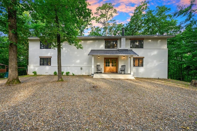 47 White Pine Rd, Broken Bow, OK 74728 - rear view of property featuring french doors and a patio