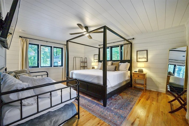 47 White Pine Rd, Broken Bow, OK 74728 - bedroom featuring wood walls, wood finished floors, and wood ceiling