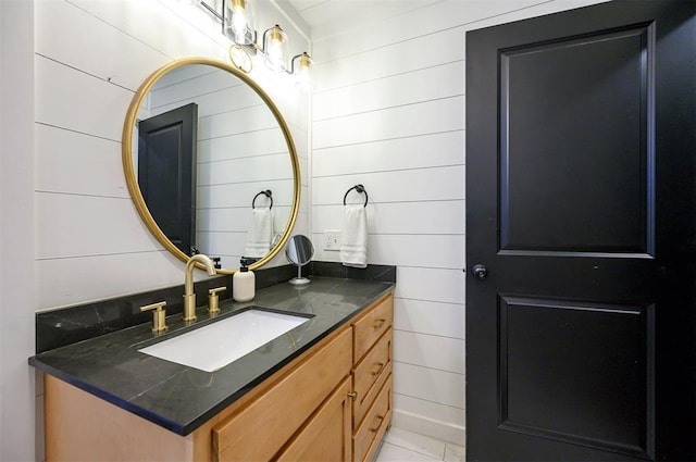 47 White Pine Rd, Broken Bow, OK 74728 - bathroom with vanity and wooden walls