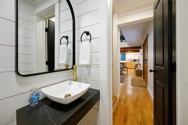 47 White Pine Rd, Broken Bow, OK 74728 - half bath with wood finished floors and vanity