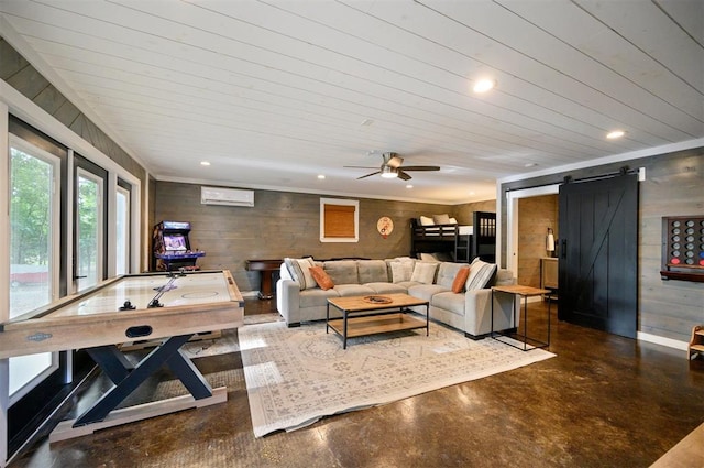 47 White Pine Rd, Broken Bow, OK 74728 - living area with a barn door, concrete flooring, wood walls, recessed lighting, and an AC wall unit