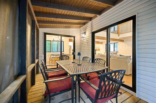 47 White Pine Rd, Broken Bow, OK 74728 - sunroom with outdoor dining area