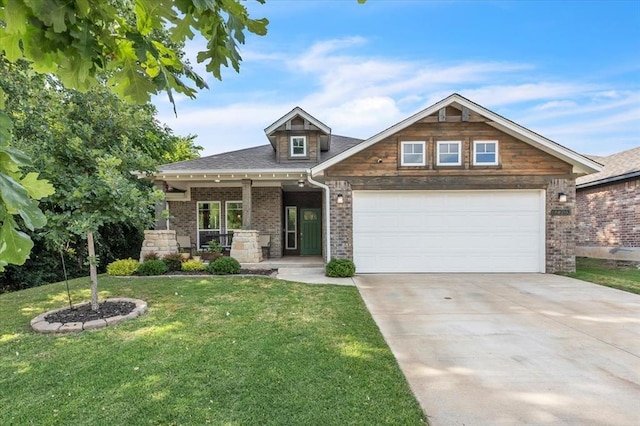 12905 NW 4th St, Yukon, OK 73099 - craftsman inspired home featuring a front lawn, driveway, brick siding, a garage, and covered porch
