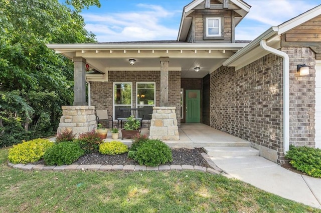 12905 NW 4th St, Yukon, OK 73099 - property entrance with a porch and brick siding