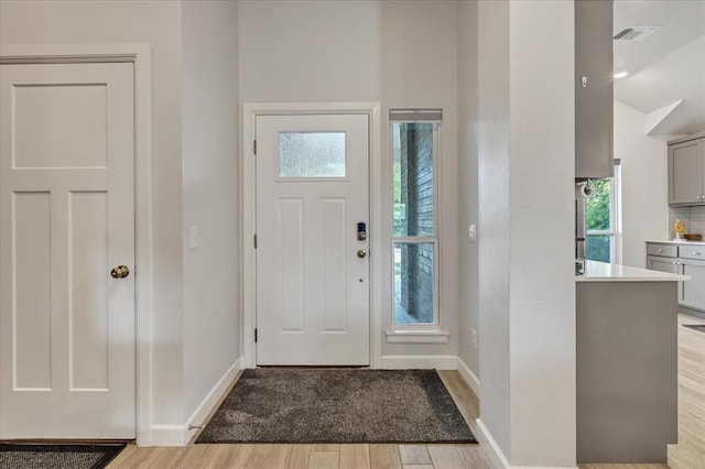12905 NW 4th St, Yukon, OK 73099 - foyer with wood finished floors and baseboards