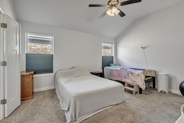 12905 NW 4th St, Yukon, OK 73099 - bedroom with vaulted ceiling, carpet flooring, baseboards, and a ceiling fan
