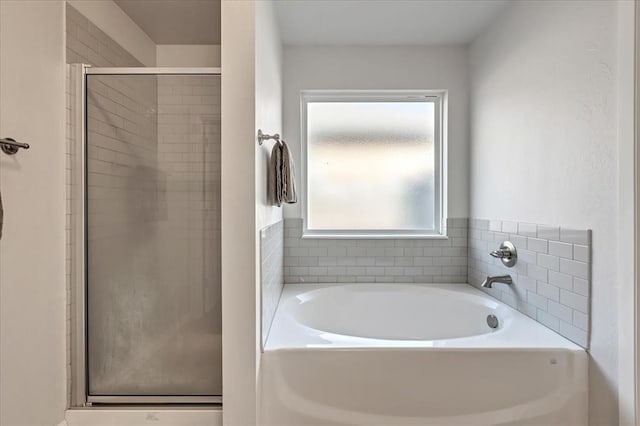 12905 NW 4th St, Yukon, OK 73099 - bathroom featuring a stall shower and a bath
