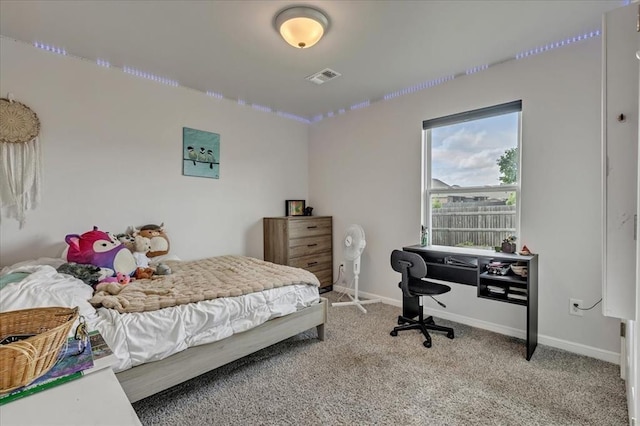 12905 NW 4th St, Yukon, OK 73099 - bedroom featuring light colored carpet and baseboards