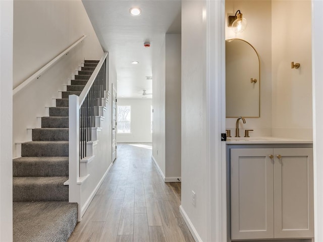 2812 Shoreridge Ave Unit 2814, Norman, OK 73072 - stairs featuring wood finished floors, baseboards, and recessed lighting