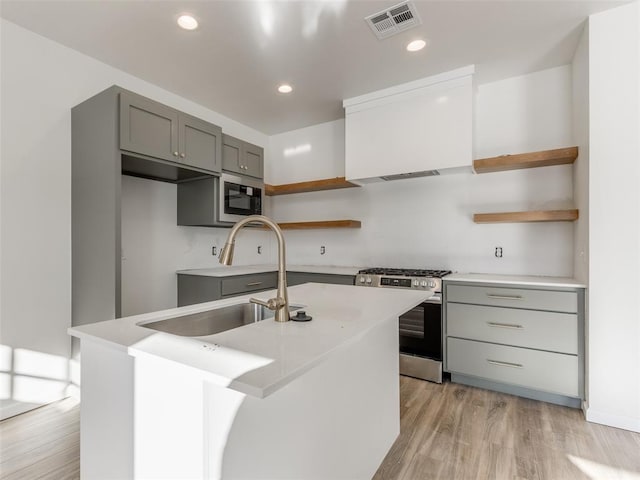 2812 Shoreridge Ave Unit 2814, Norman, OK 73072 - kitchen featuring open shelves, stainless steel range with gas cooktop, built in microwave, gray cabinets, and recessed lighting