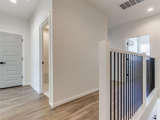2812 Shoreridge Ave Unit 2814, Norman, OK 73072 - hallway featuring light wood-style flooring, baseboards, and recessed lighting