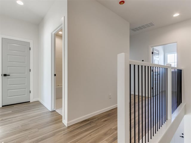 2812 Shoreridge Ave Unit 2814, Norman, OK 73072 - hall featuring light wood-style flooring, baseboards, and recessed lighting