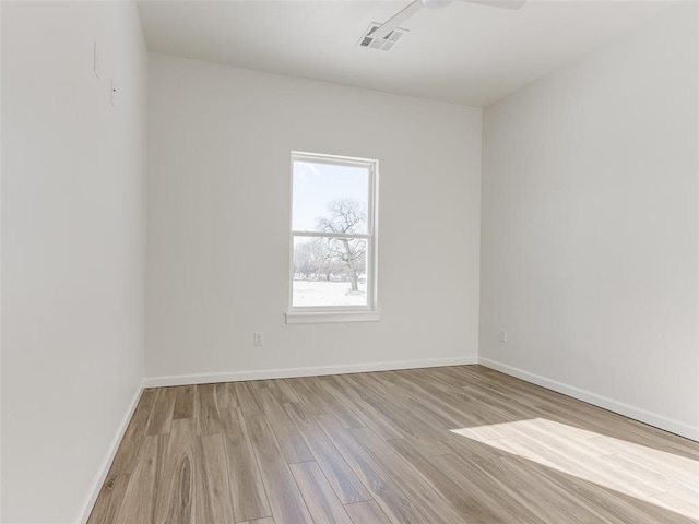 2812 Shoreridge Ave Unit 2814, Norman, OK 73072 - empty room with light wood finished floors and baseboards