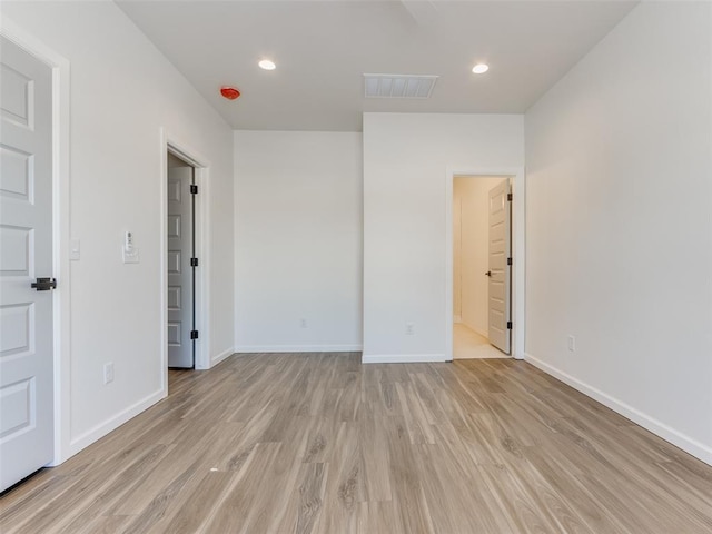 2812 Shoreridge Ave Unit 2814, Norman, OK 73072 - unfurnished room with light wood-type flooring, baseboards, and recessed lighting