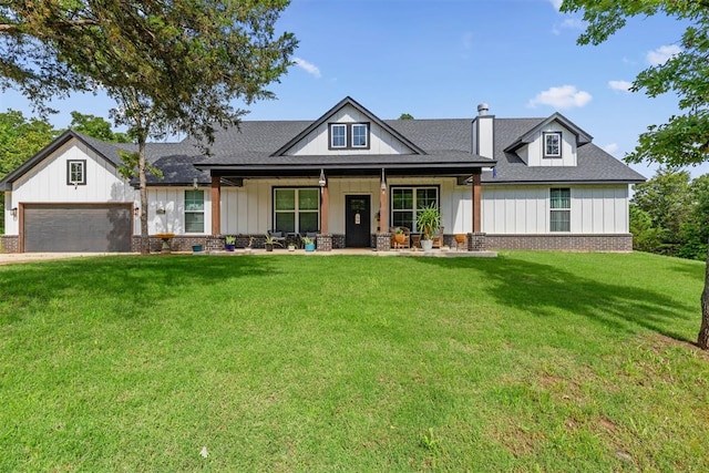 16315 SE 59th St, Choctaw, OK 73020 - modern farmhouse with board and batten siding, a porch, a front lawn, and a garage