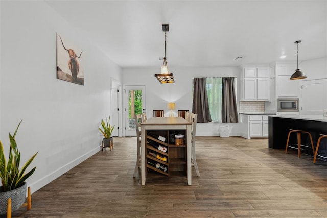 16315 SE 59th St, Choctaw, OK 73020 - dining area featuring wood finished floors and baseboards