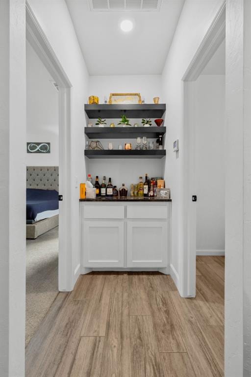16315 SE 59th St, Choctaw, OK 73020 - indoor dry bar with light wood finished floors and baseboards