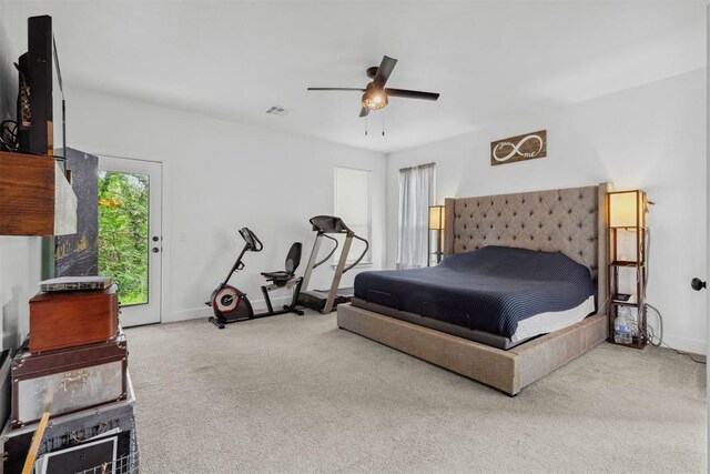 16315 SE 59th St, Choctaw, OK 73020 - carpeted bedroom featuring access to exterior, baseboards, and a ceiling fan