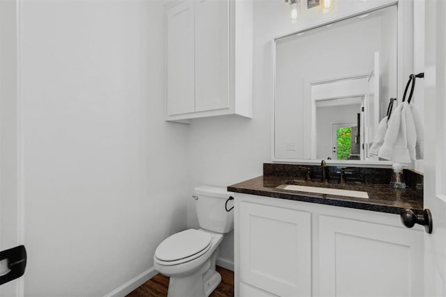 16315 SE 59th St, Choctaw, OK 73020 - half bathroom featuring vanity, toilet, baseboards, and wood finished floors