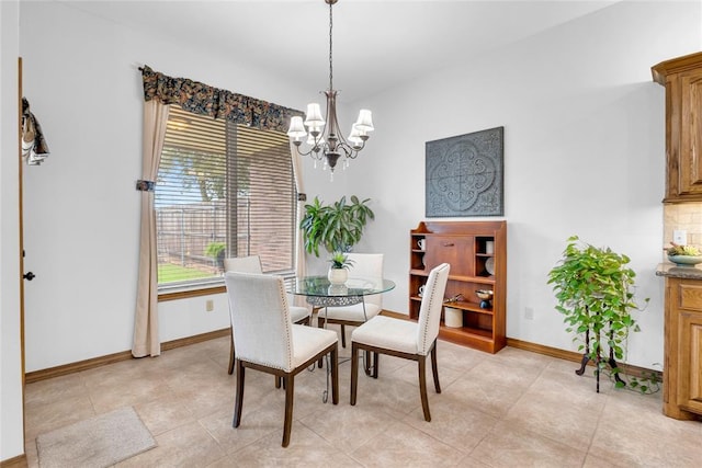 1116 River Birch Dr, Yukon, OK 73099 - dining room featuring a chandelier and baseboards