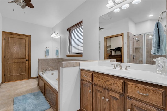 1116 River Birch Dr, Yukon, OK 73099 - bathroom featuring a ceiling fan, vanity, a stall shower, and a bath