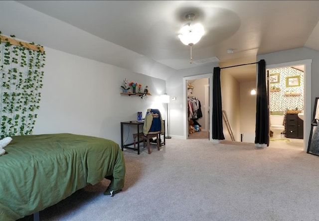 15963 Trail Head Rd, Mcloud, OK 74851 - bedroom featuring carpet floors, a walk in closet, lofted ceiling, and ensuite bath