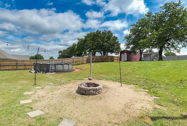 15963 Trail Head Rd, Mcloud, OK 74851 - view of yard with an outdoor fire pit