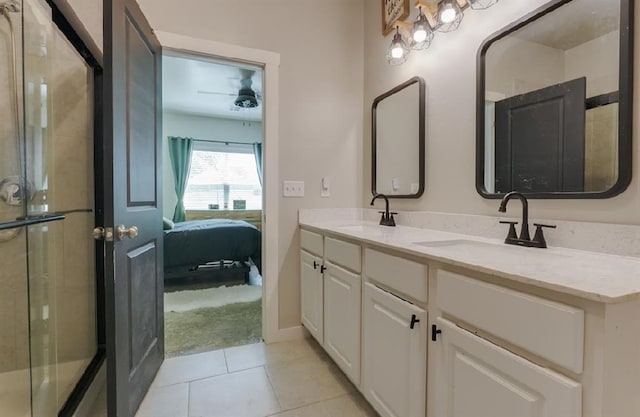 15963 Trail Head Rd, Mcloud, OK 74851 - bathroom with double vanity, ensuite bathroom, tile patterned flooring, and an enclosed shower