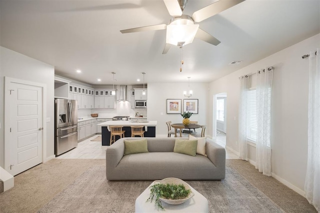 18020 Mounts Farm Rd, Edmond, OK 73012 - living area with light carpet, recessed lighting, baseboards, and ceiling fan