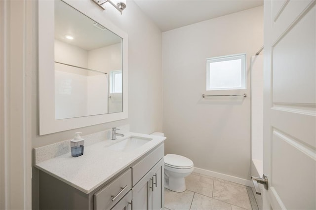 18020 Mounts Farm Rd, Edmond, OK 73012 - full bath with vanity, toilet, plenty of natural light, and shower / bath combination