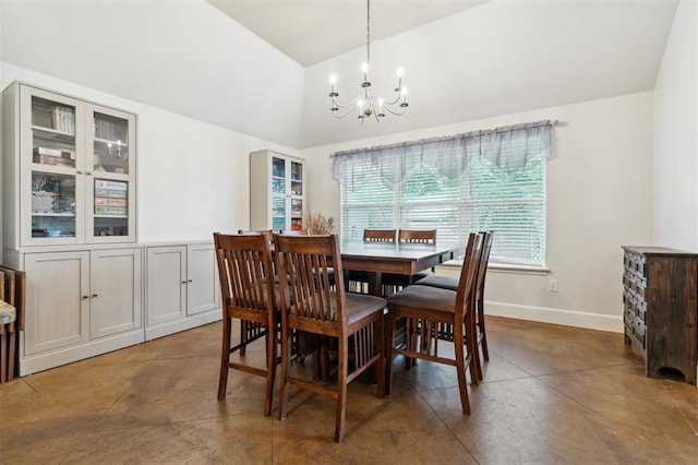 4605 NW 161st St, Edmond, OK 73013 - dining space with a chandelier, concrete floors, baseboards, and high vaulted ceiling