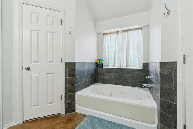 4605 NW 161st St, Edmond, OK 73013 - bathroom featuring a jetted tub, tile walls, and wainscoting