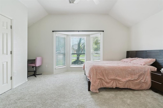 4605 NW 161st St, Edmond, OK 73013 - carpeted bedroom with vaulted ceiling, a ceiling fan, and baseboards