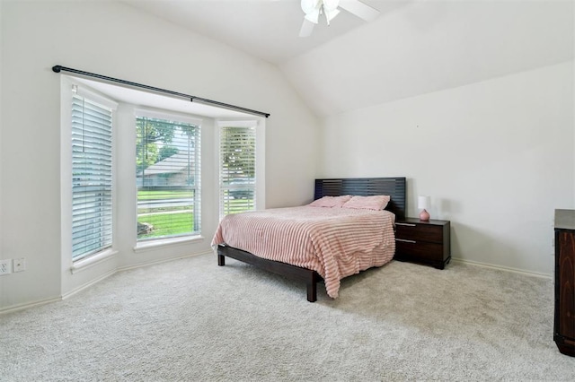 4605 NW 161st St, Edmond, OK 73013 - carpeted bedroom with vaulted ceiling, a ceiling fan, and baseboards
