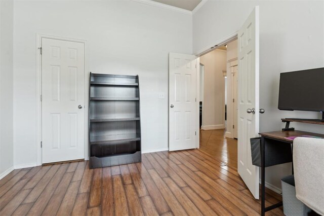4605 NW 161st St, Edmond, OK 73013 - unfurnished office featuring ornamental molding, wood finished floors, and baseboards