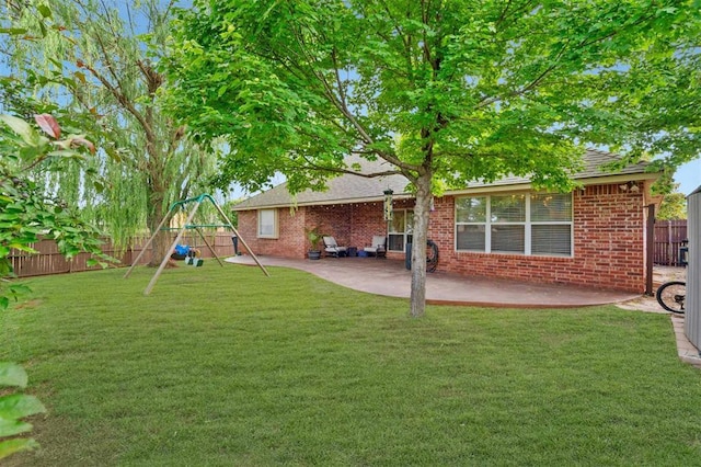4605 NW 161st St, Edmond, OK 73013 - view of yard featuring a playground and a patio area